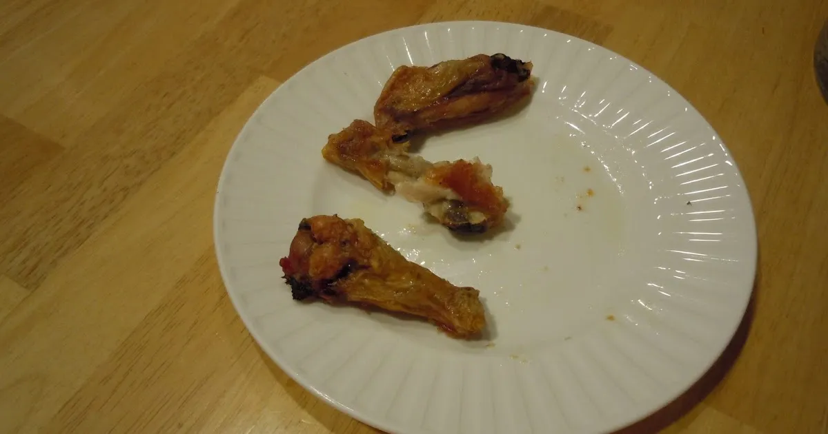 Plate of half-eaten wings.